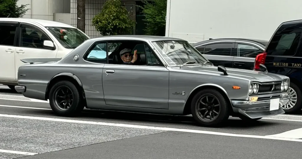 a classic "Hakosuka" Skyline GTR on the streets on Akihabara in Tokyo