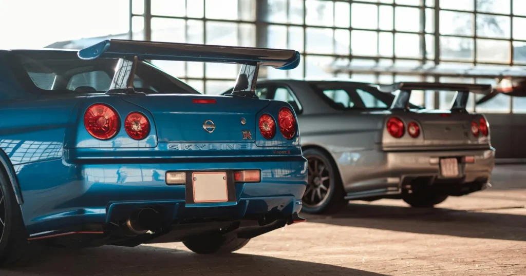 a pair of R34 Nissan Skyline GTRs which inspired many Americans to import a JDM vehicle